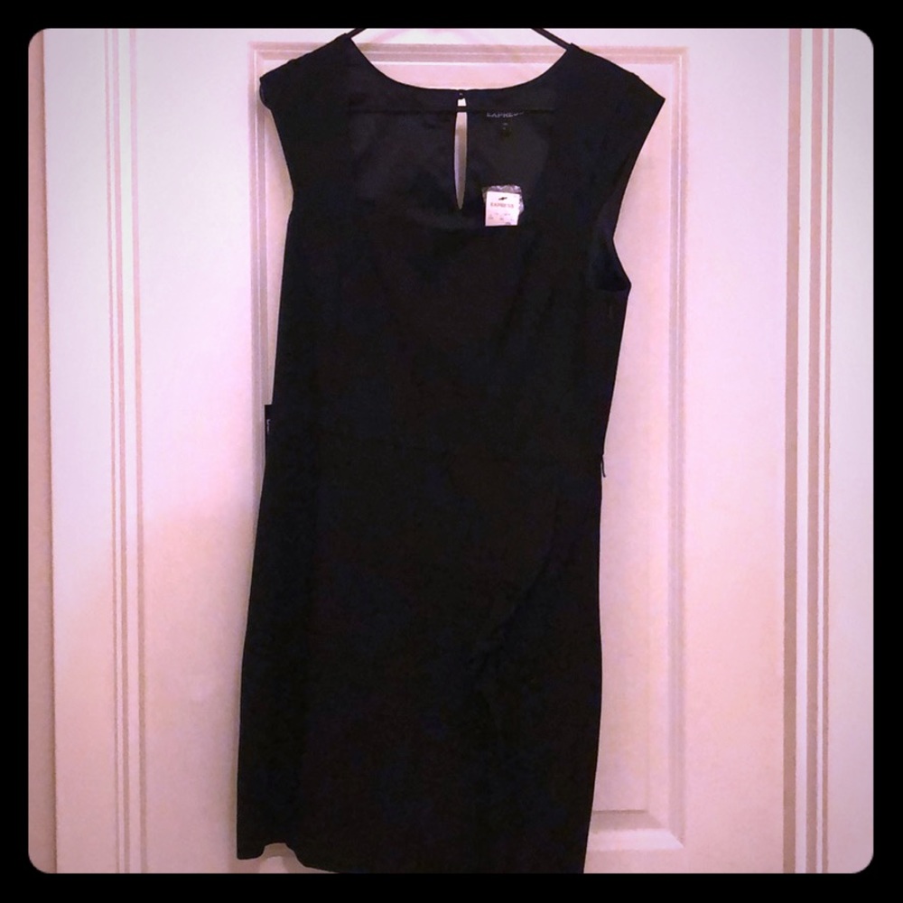Beautiful black cocktail dress. Never worn w/tags!